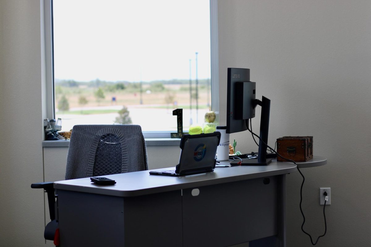 Big windows are common at Memorial. Here is a teacher's room that offers a view of the highway. 