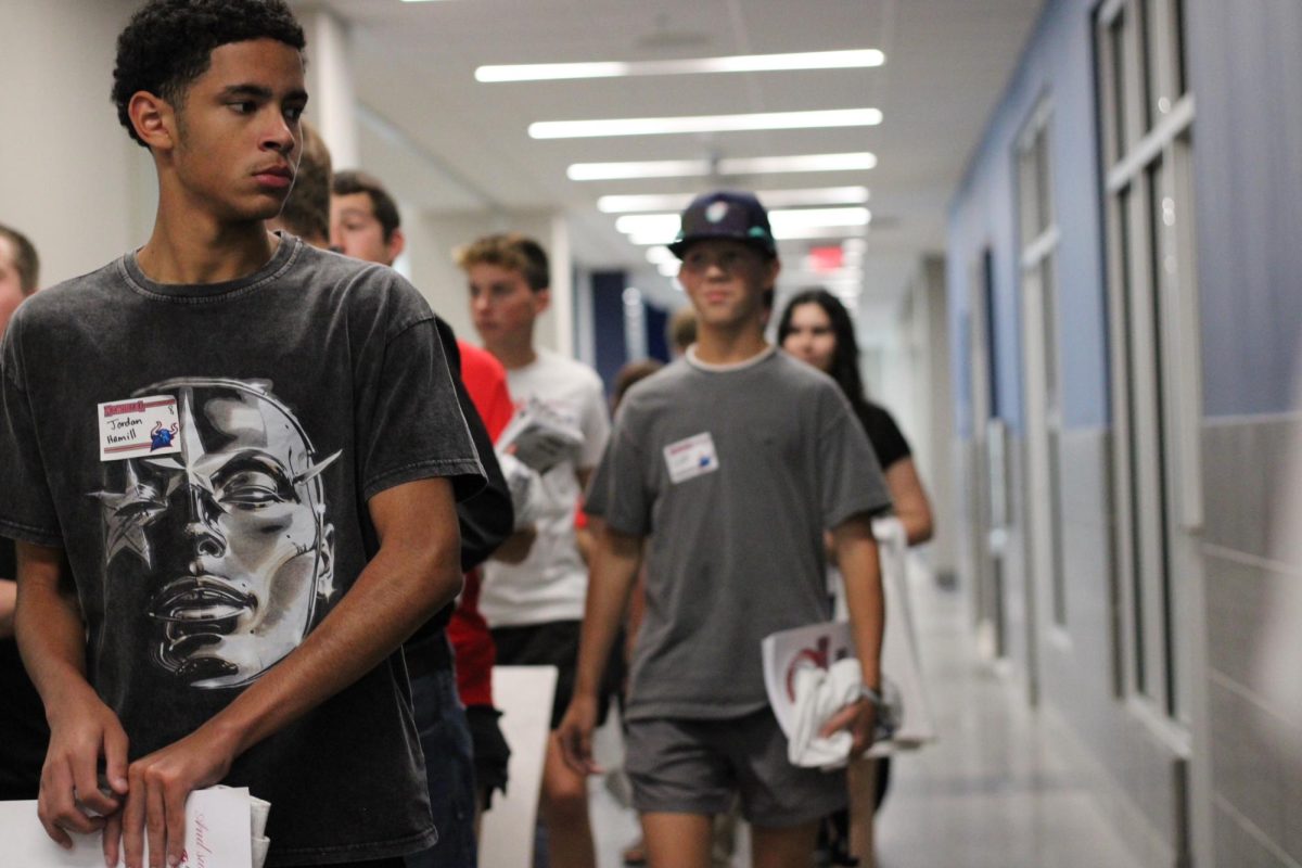 Students tour the hallways of Memorial High School during last week's orientation. 