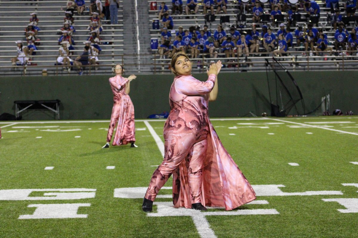 Senior Rachel Zuniga performs during halftime of Memorial's Sept. 27 football game. 