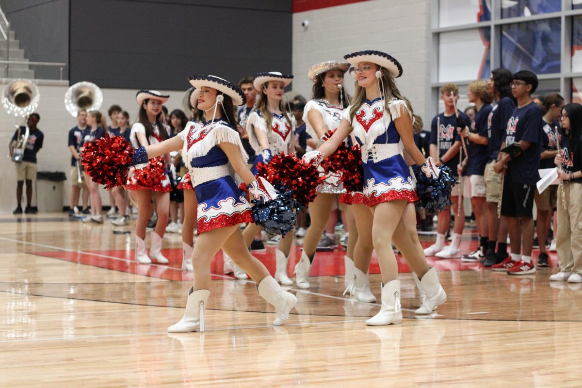 The Sapphires march out to a performance during Bull School in August. 