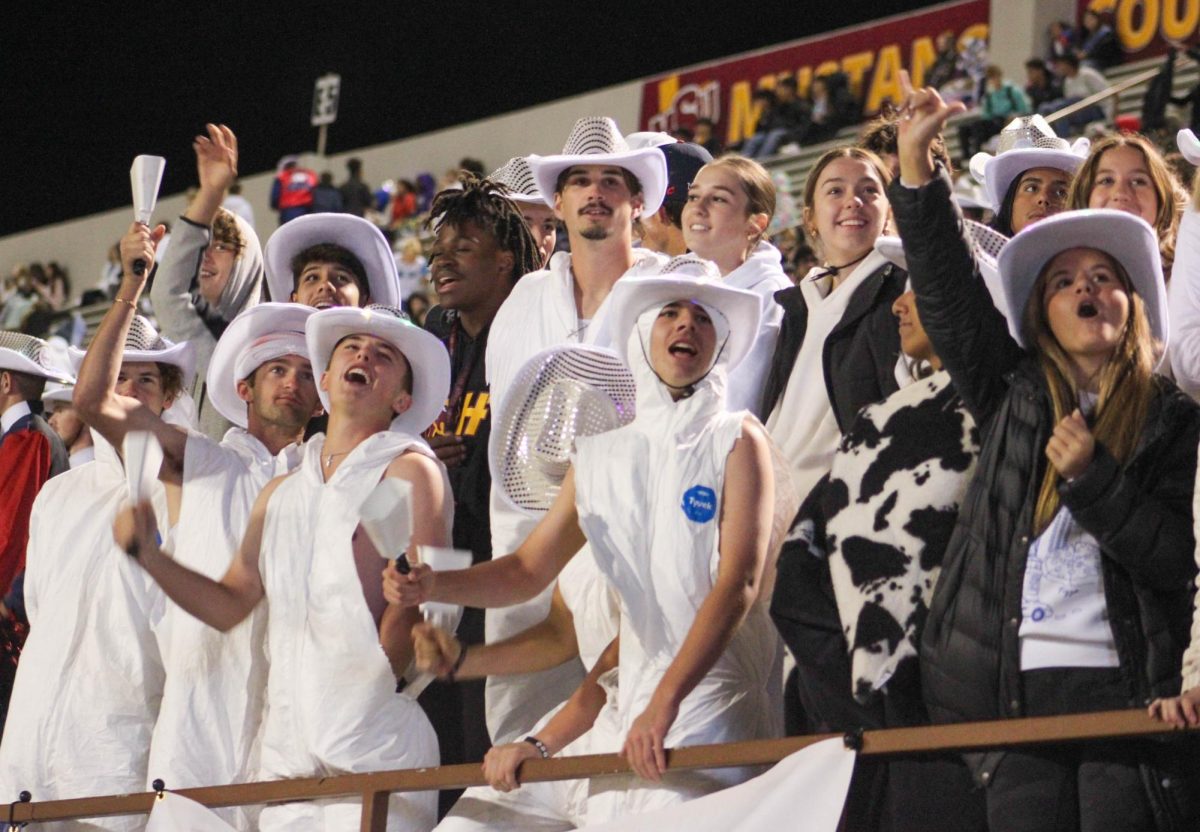 Memorial's student section reacts during the Mavericks' first football game against Legacy. Memorial won, 51-21. 