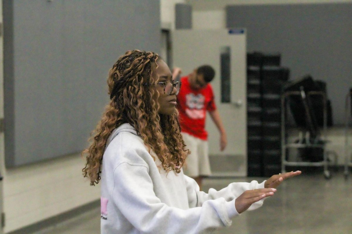 London Boyd is one of two drum majors for the Maverick marching band. 