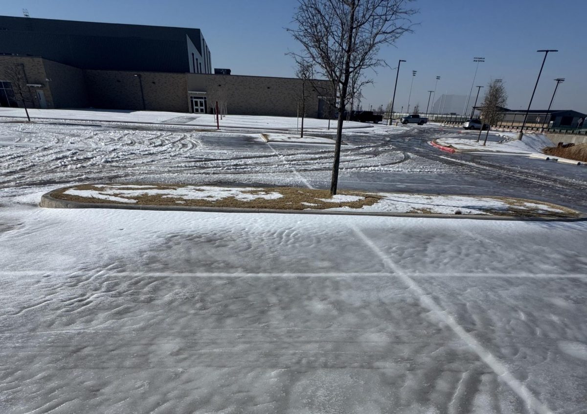 The parking lots of Memorial High School still were covered in ice days after the winter storm hit. 
