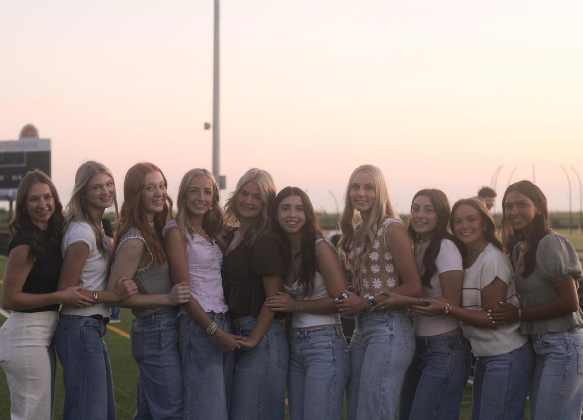 Senior girls poise for a picture during the Senior Sunrise event in August. Senior Sunset will be May 17. 